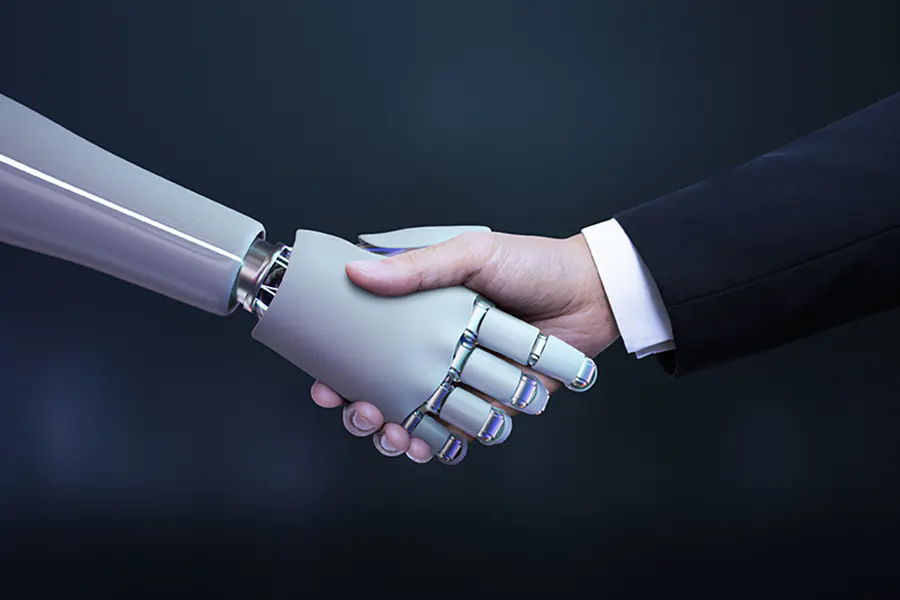 AI Robot and human handshake